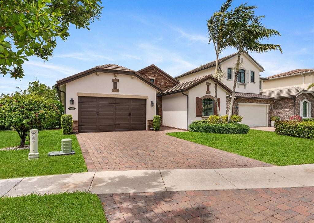Photo of 8259 Grand Prix Lane, Boynton Beach, FL 33472 (MLS # B26036060)