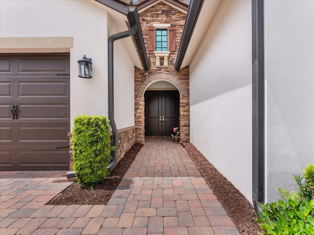 Photo of 8259 Grand Prix Lane, Boynton Beach, FL 33472 (MLS # B26036060)
