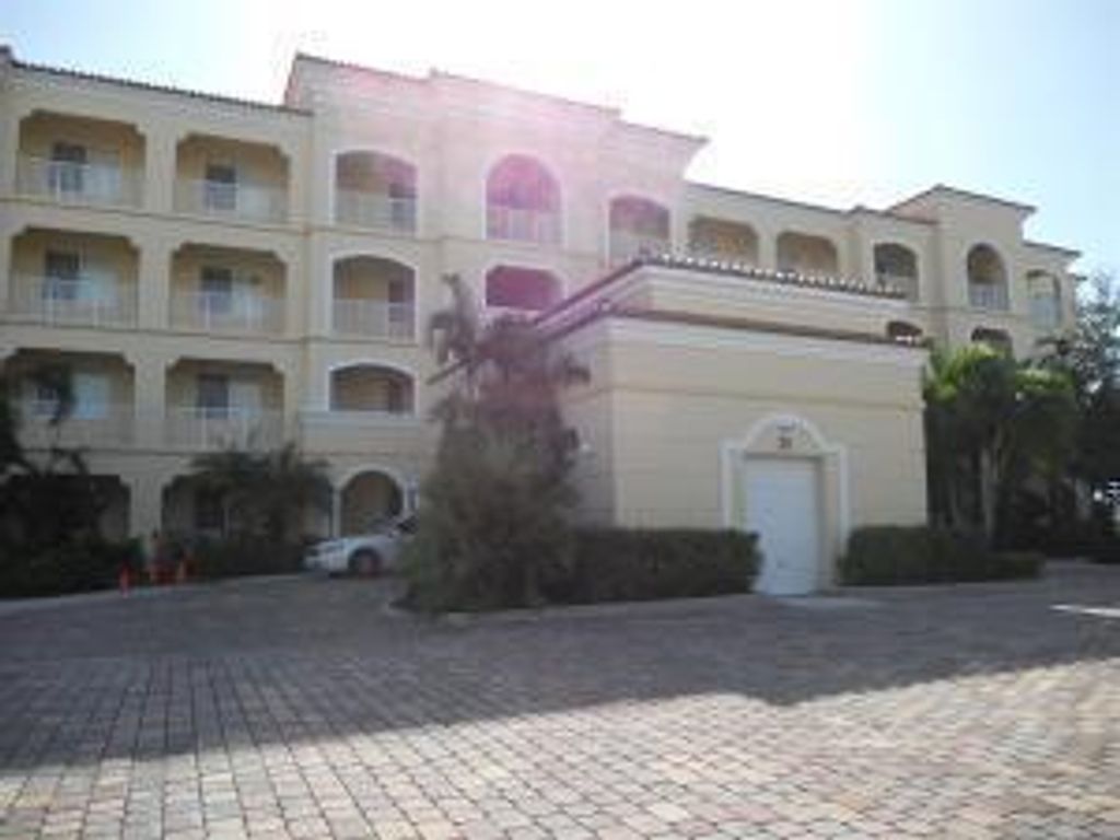 Photo of 21 W Harbour Isle Drive W #105, Fort Pierce, FL 34949 (MLS # R10690505)