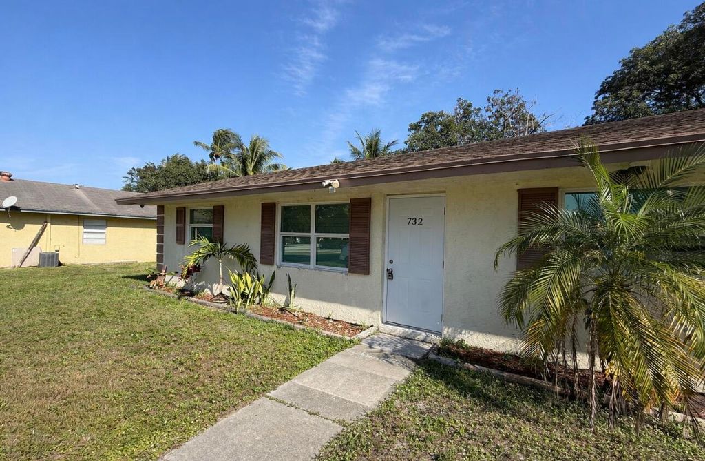 Photo of 732 Neil Road, West Palm Beach, FL 33415 (MLS # R11148933)