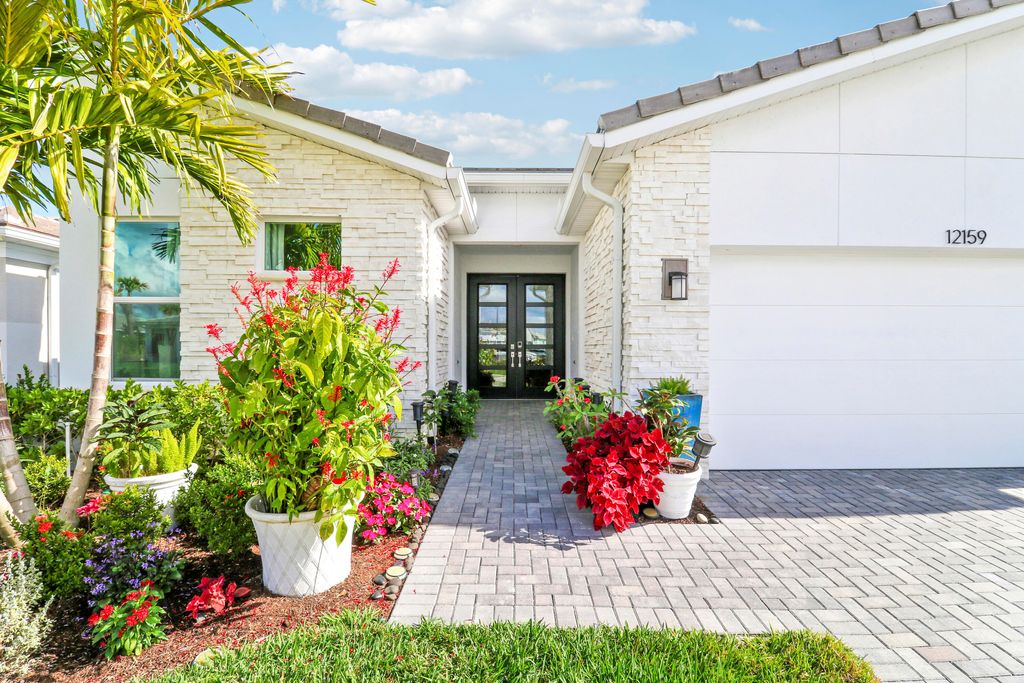Photo of 12159 SW Ameresque Way, Port Saint Lucie, FL 34987 (MLS # R11150679)