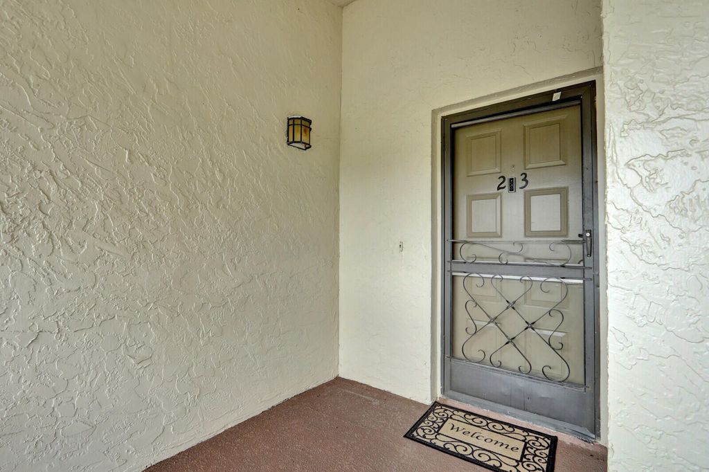 Photo of 12910 Briarlake Circle #203, Palm Beach Gardens, FL 33418 (MLS # B26013781)