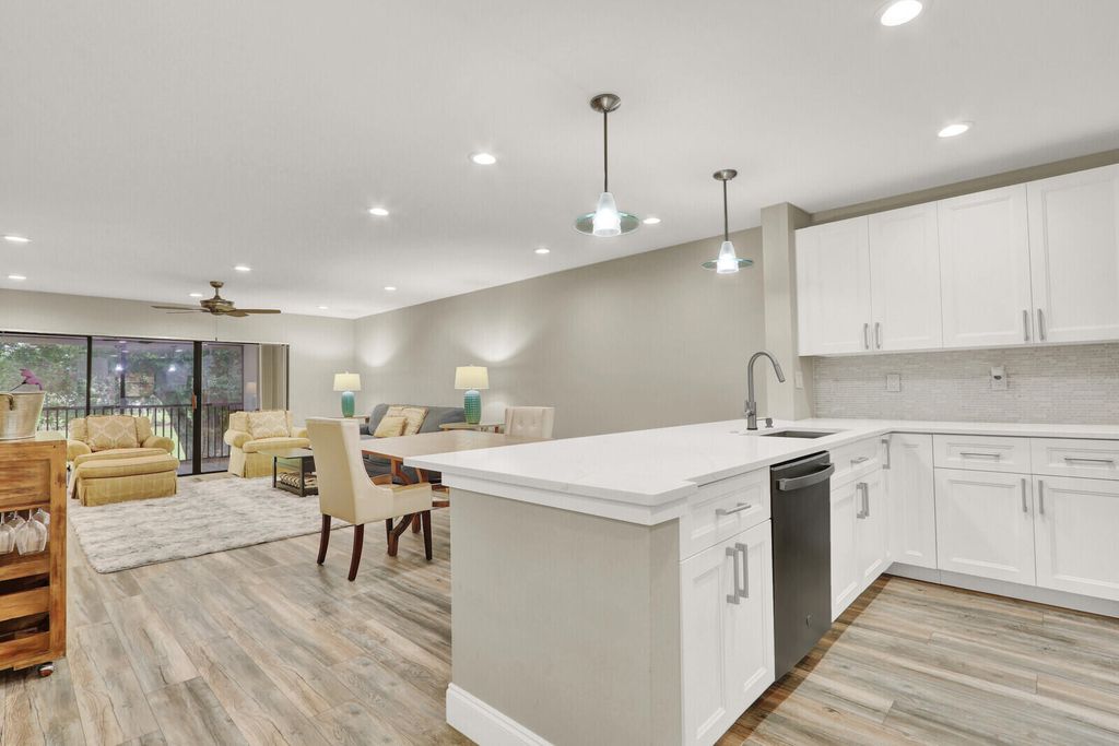 Photo of 12910 Briarlake Circle #203, Palm Beach Gardens, FL 33418 (MLS # B26013781)