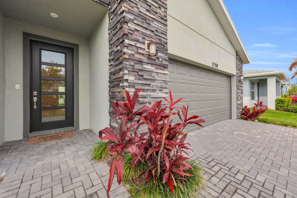 Photo of 12758 SW Phoenix Drive, Port Saint Lucie, FL 34987 (MLS # B26040765)