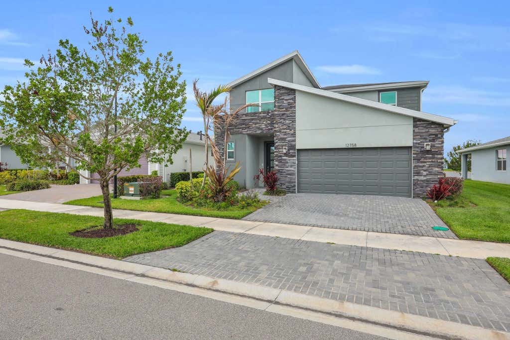 Photo of 12758 SW Phoenix Drive, Port Saint Lucie, FL 34987 (MLS # B26040765)