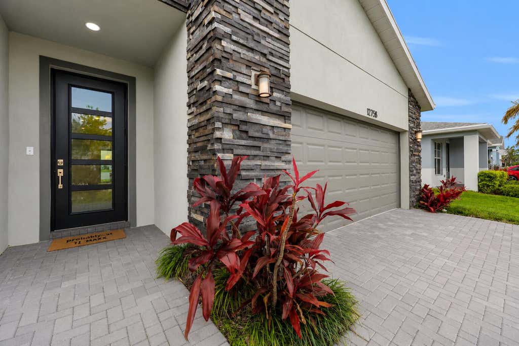 Photo of 12758 SW Phoenix Drive, Port Saint Lucie, FL 34987 (MLS # B26040765)