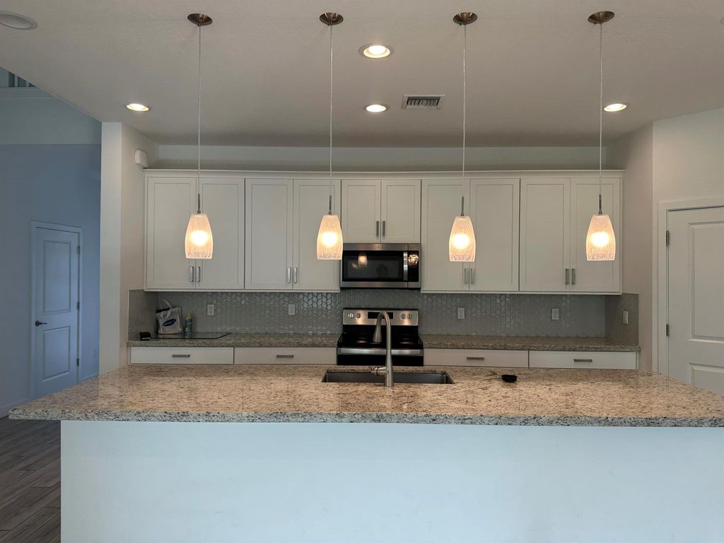 Photo of 4403 Arcturus Lane, Lake Worth, FL 33467 (MLS # R11116672)