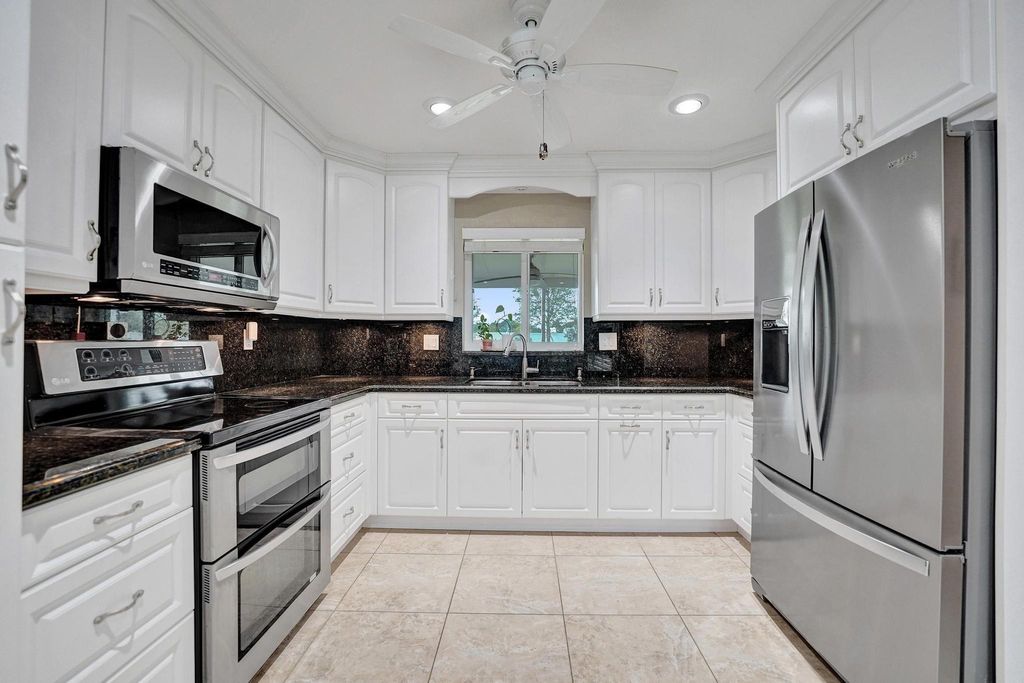 Photo of 4721 SW 72nd Ave, Davie, FL 33314 (MLS # F10524771)