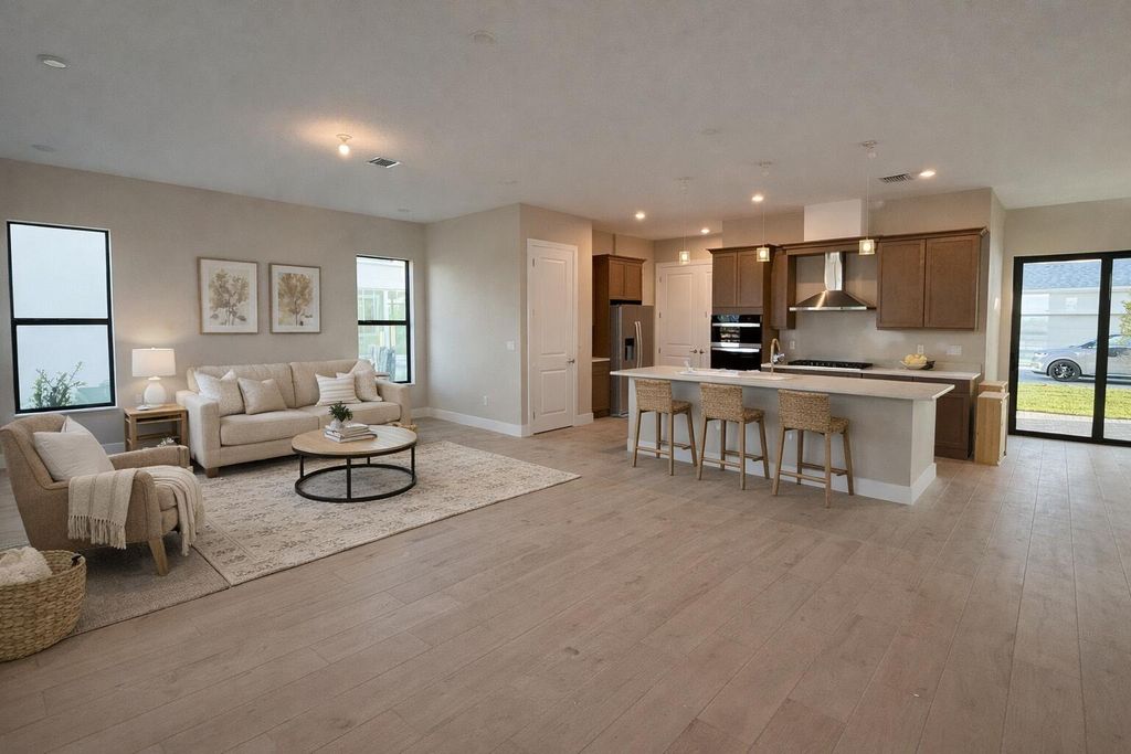 Photo of 10910 SW Pioneer Pkwy, Palm City, FL 34990 (MLS # R11145959)