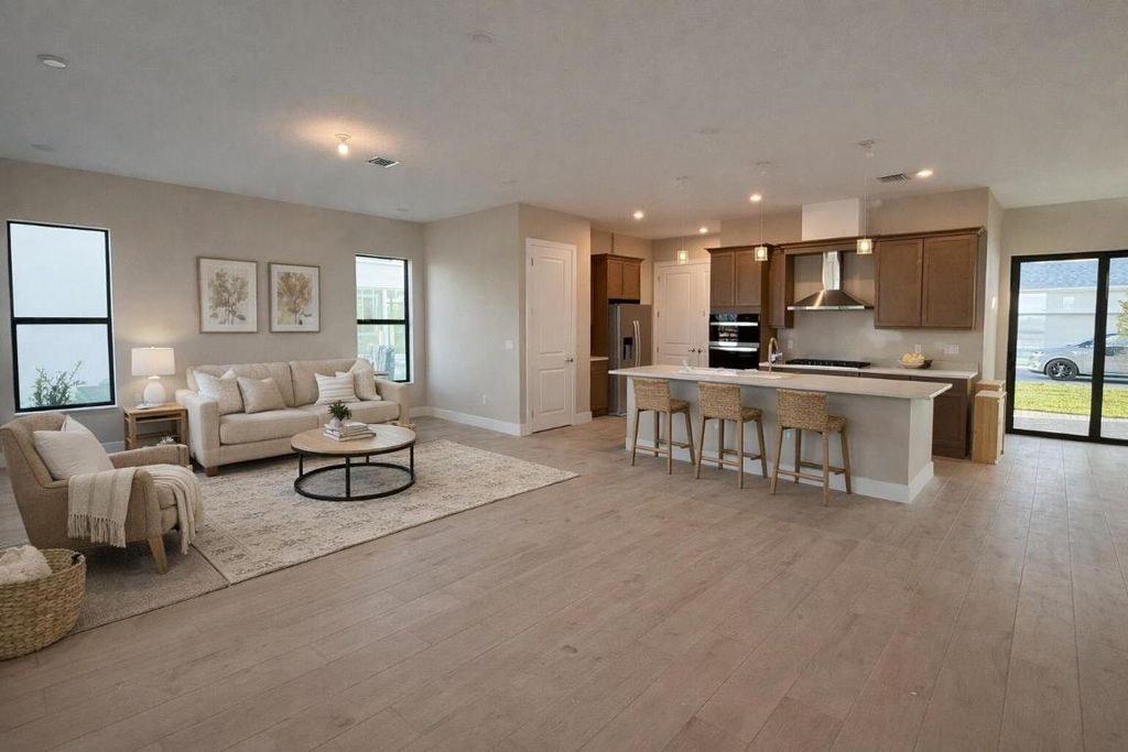 Photo of 10910 SW Pioneer Pkwy, Palm City, FL 34990 (MLS # R11145959)