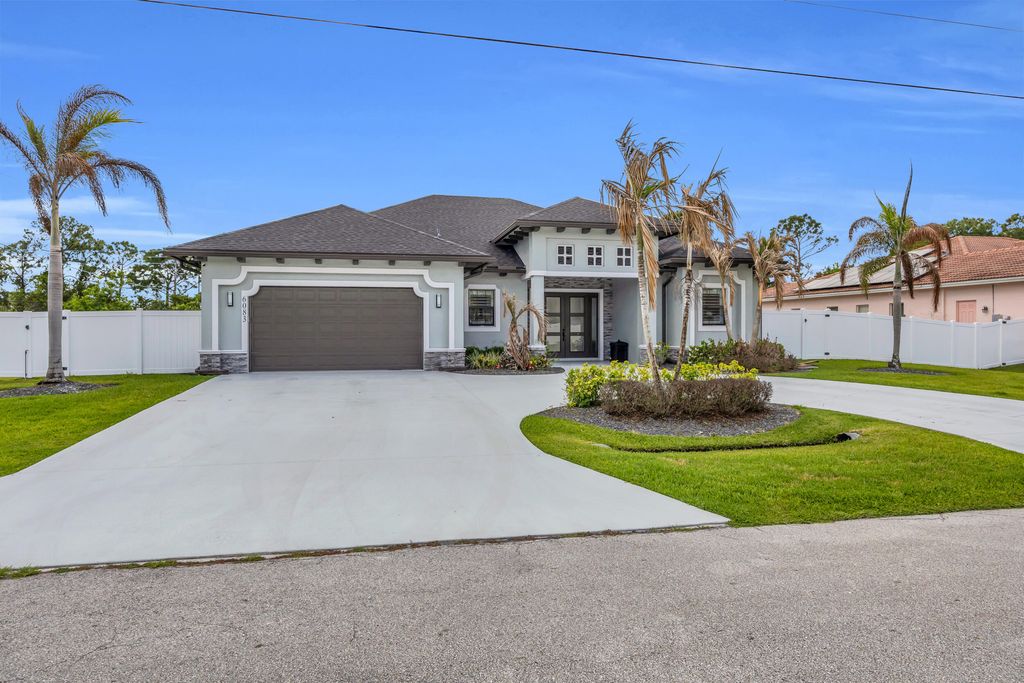 Photo of 6083 NW East Deville Circle, Port Saint Lucie, FL 34986 (MLS # B26020339)