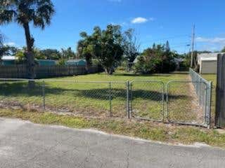 Photo of 1846 NE 22nd Drive, Jensen Beach, FL 34957 (MLS # R10679896)