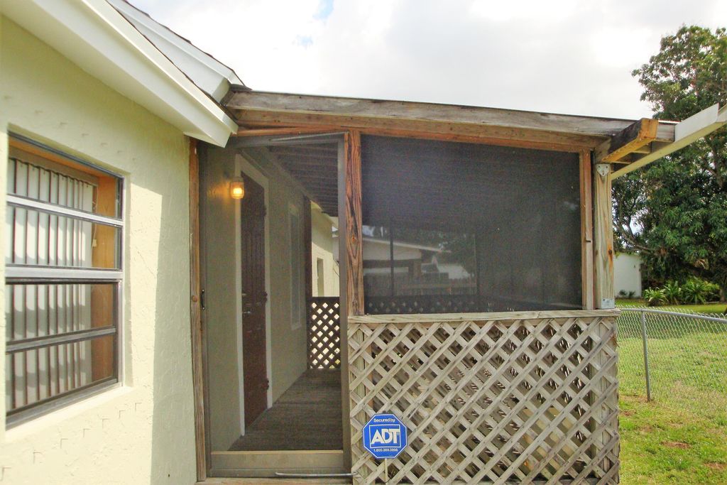 Photo of 3938 Serubi Avenue, Palm Springs, FL 33461 (MLS # R10998352)