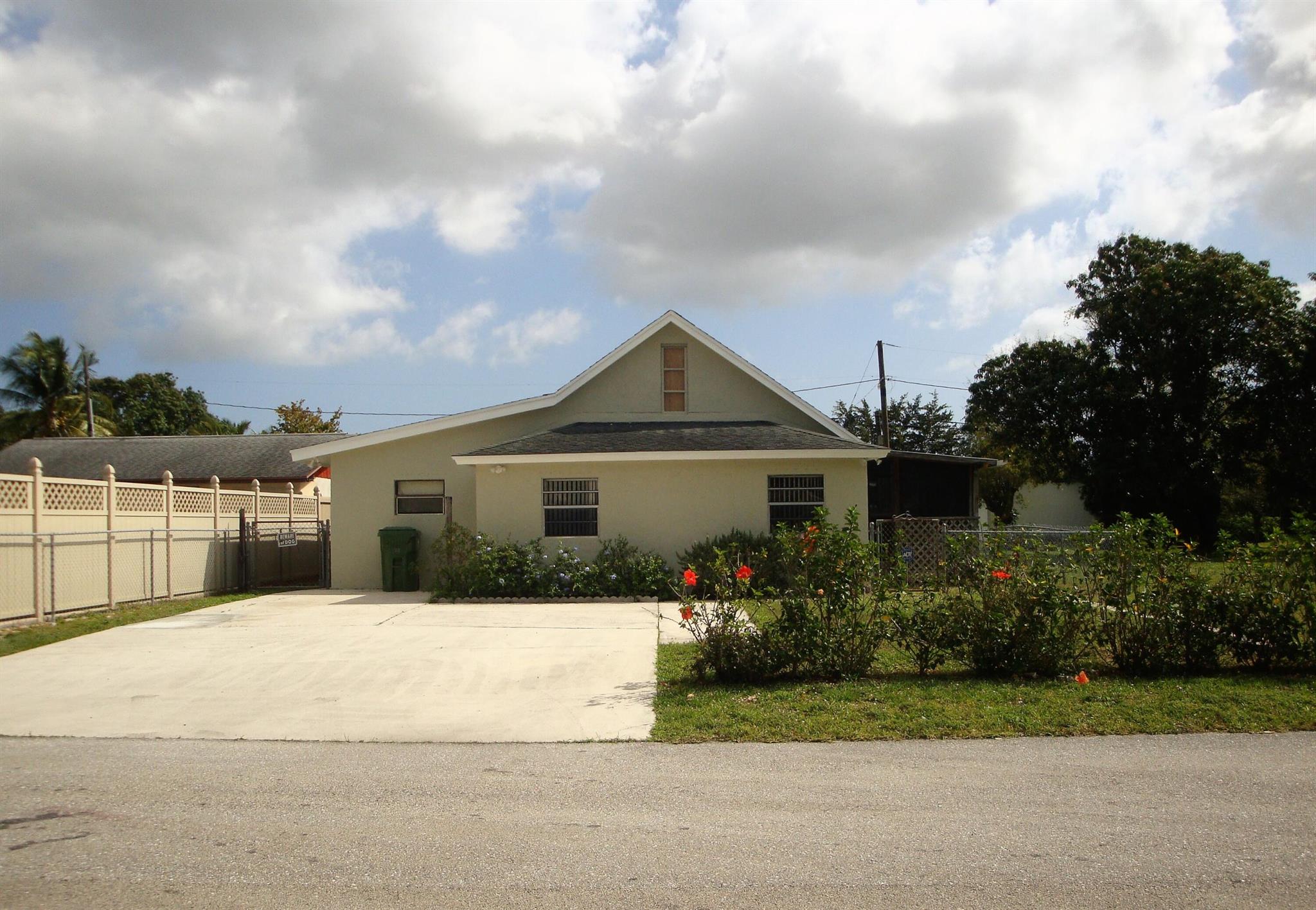Upgraded single family home with 2 Bedrooms, 1 Bathroom, Covered screened porch, laundry room with full size washer & dryer. Fully fenced backyard covered patio for family entertaining, storage, extended driveway, no association. ''Landlord maintains the lawn.'' First, Last & Security deposits required for lease.