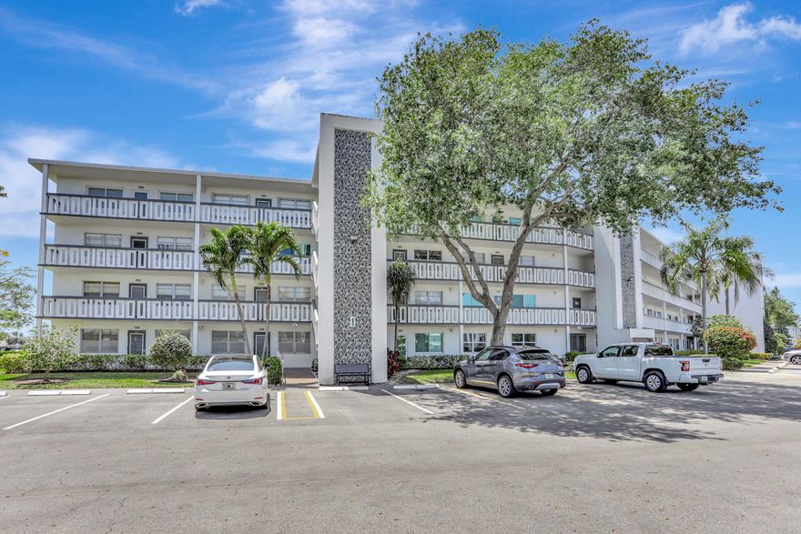 Welcome to refined and easy 55+ living in this light-filled and generously sized 2 bedroom, 2 bathroom residence in the highly desirable Century Village Deerfield Beach. This charming condo offers one of the community's most preferred floor plans, freshly updated paint, stylish improvements, no carpeting, and a fully enclosed Florida room ideal for unwinding or hosting guests. Perfectly positioned just steps from the laundry room and your assigned storage space. Oakridge D is a beautifully maintained elevator building recognized for its solid financials and pristine landscaping. Experience an active, resort-inspired lifestyle with pools, clubhouse, fitness center, tennis courts, transportation services, and more, all conveniently located near shopping, dining, and the beach.
