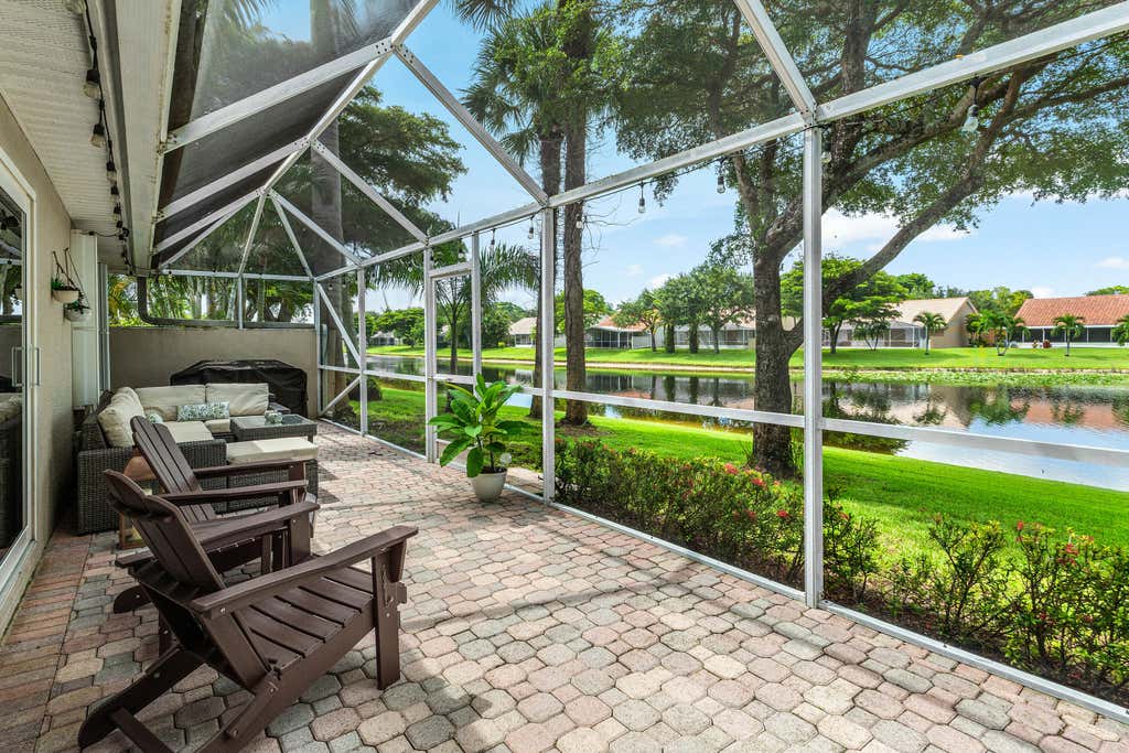 Photo of 5554 GRANDE PALM Circle, Delray Beach, FL 33484 (MLS # B26065424)