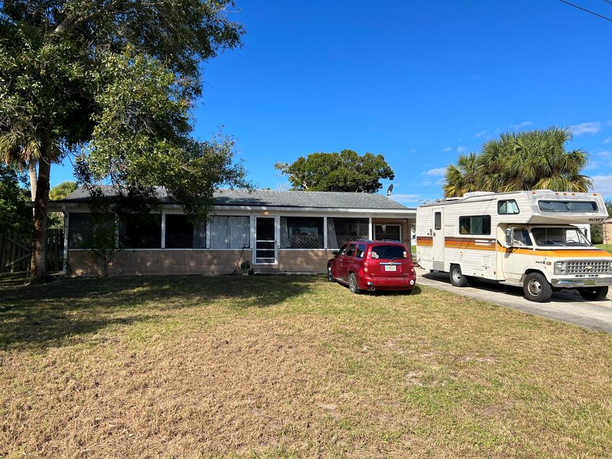 Great location nestled between Fort Pierce and Vero Beach.  This 4 bedroom fixer upper has great bones just needs a little TLC.  Located on a corner lot with a large front porch.
