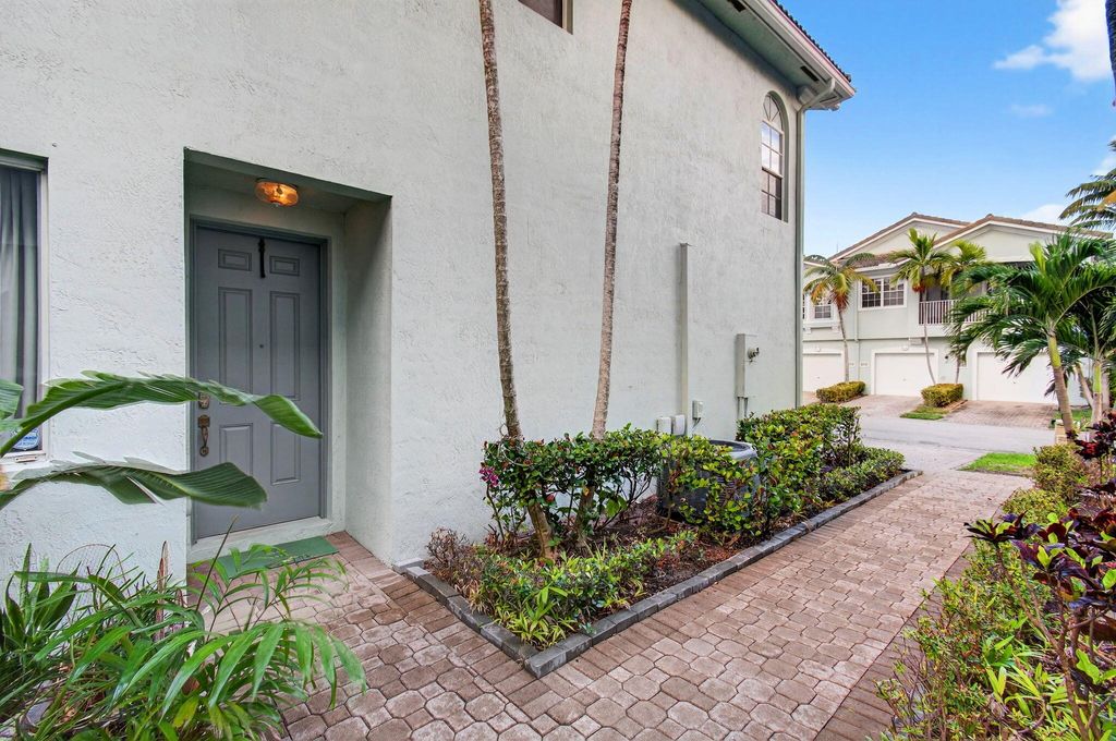 Photo of 3167 Laurel Ridge Circle, Riviera Beach, FL 33404 (MLS # B26005155)