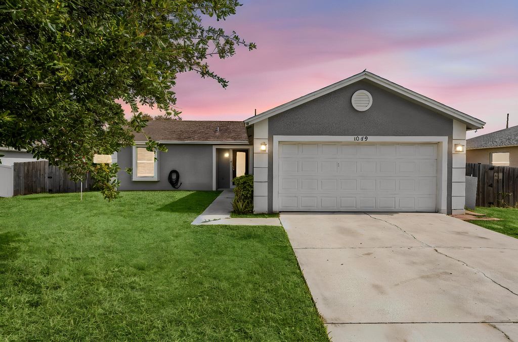Photo of 1049 SW Mccracken Avenue, Port Saint Lucie, FL 34953 (MLS # B26026941)