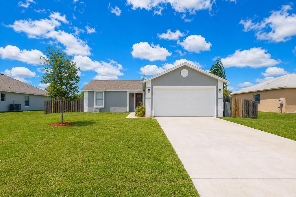 Photo of 1049 SW Mccracken Avenue, Port Saint Lucie, FL 34953 (MLS # B26026941)