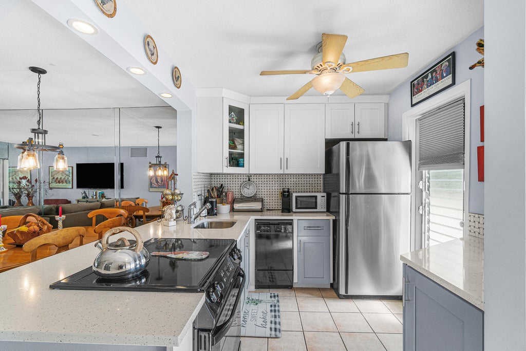Photo of 2161 NE 1st Court #205, Boynton Beach, FL 33435 (MLS # B26075056)