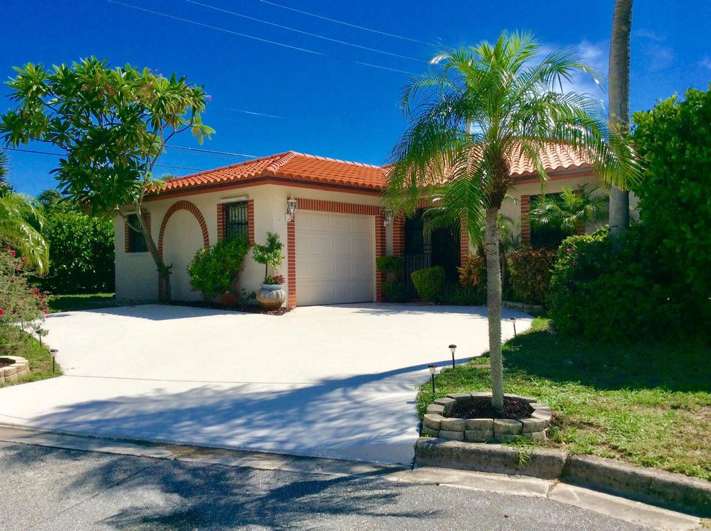Photo of 1035 Soelca Drive, West Palm Beach, FL 33405 (MLS # R11105741)
