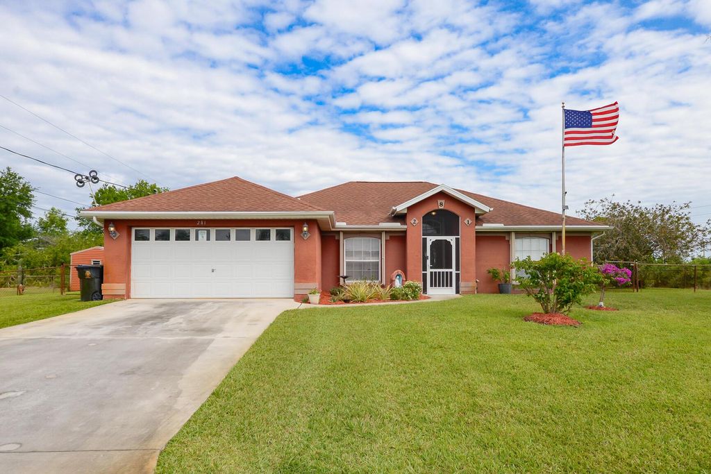 Photo of 281 SW Undallo Road, Port Saint Lucie, FL 34953 (MLS # R11048775)