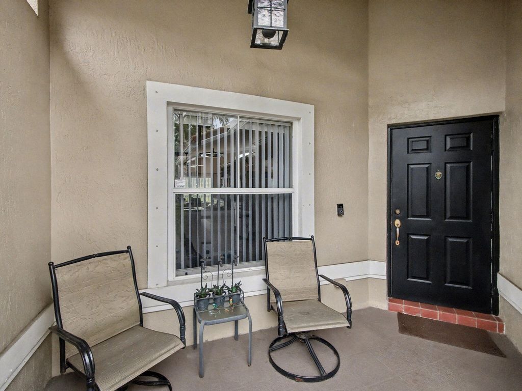 Photo of 6292 Grand Cypress Circle, Lake Worth, FL 33463 (MLS # B26019976)