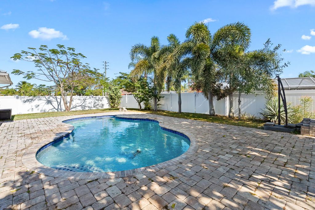 Photo of 397 NE Jonquil Street, Port Saint Lucie, FL 34983 (MLS # R11157629)