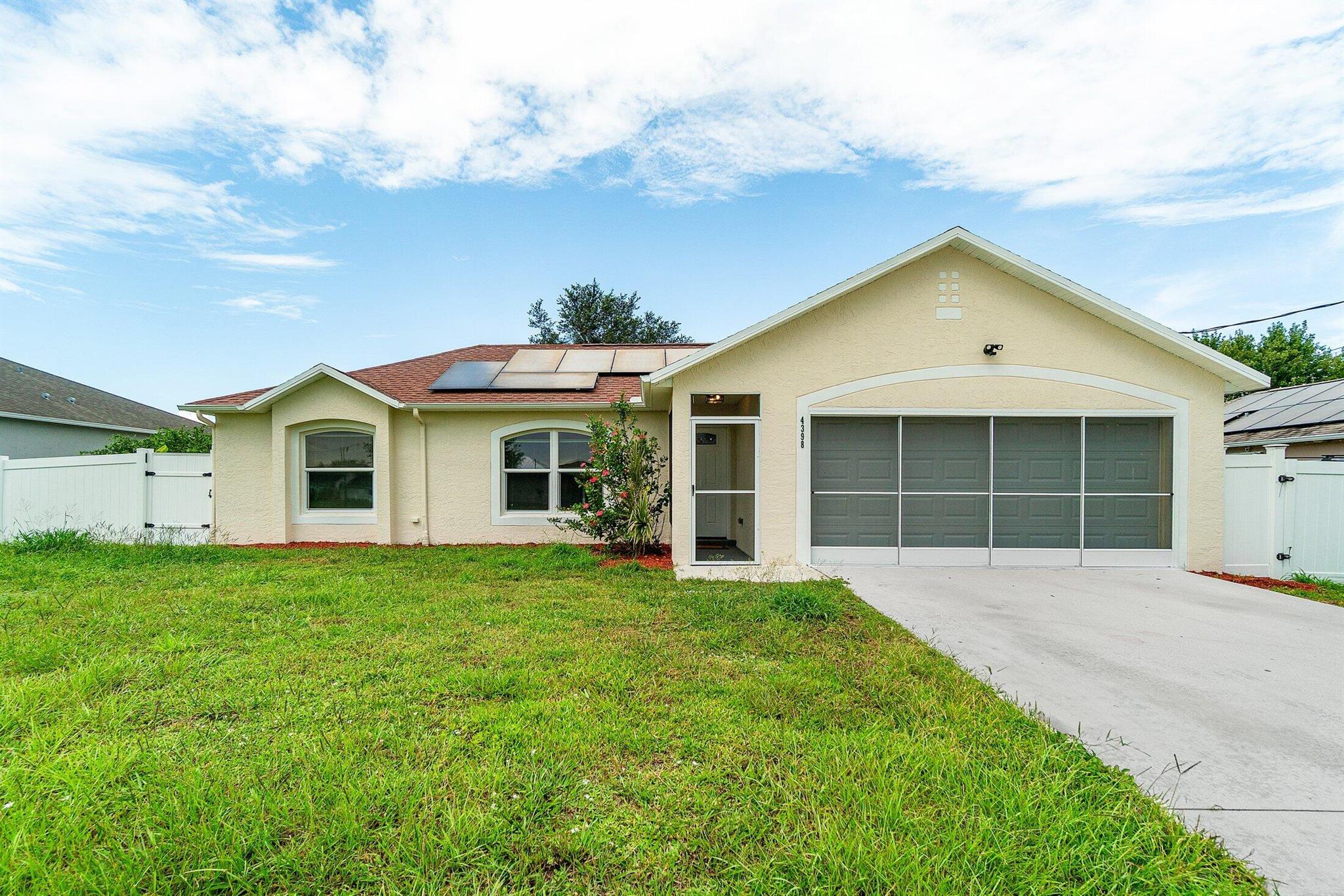 Beautifully renovated 3 bedroom, 2 bathroom home plus office featuring a stunning new kitchen with white cabinets, granite countertops, and stainless steel appliances. Bathrooms boast new vanities, tile, and fixtures. Enjoy new luxury flooring throughout, AC 2021, roof 2018, garage door 2019, and energy-saving solar panels 2022. Situated on a large yard, perfect for outdoor living.