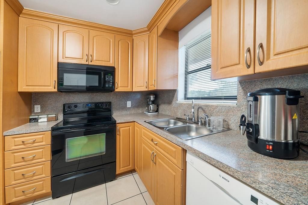 Photo of 21894 Lake Forest Cir #201, Boca Raton, FL 33433 (MLS # F10395002)