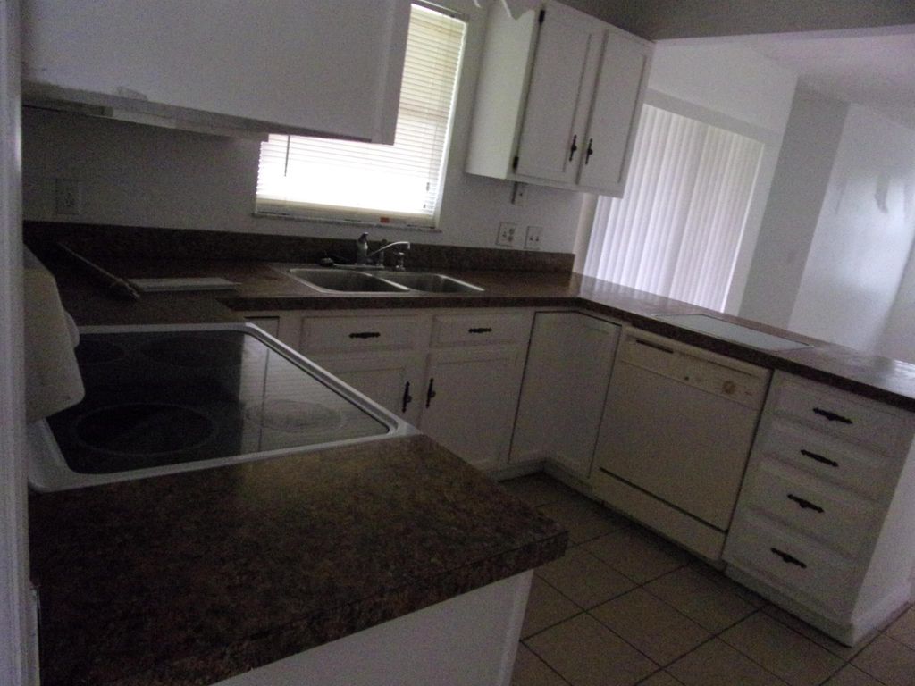 Photo of 513 SE Crosspoint Drive, Port Saint Lucie, FL 34983 (MLS # R11139573)