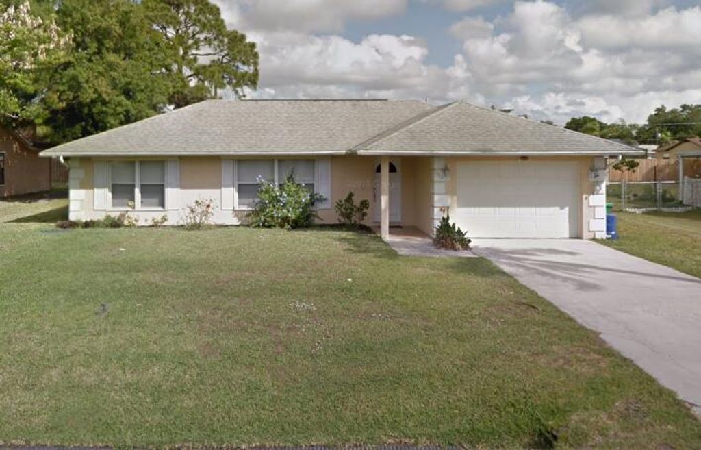 Photo of 513 SE Crosspoint Drive, Port Saint Lucie, FL 34983 (MLS # R11139573)