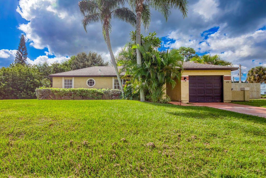 Photo of 698 SW Todd Avenue, Port Saint Lucie, FL 34983 (MLS # R11131879)