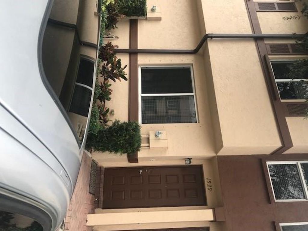 Photo of 1929 Hibiscus Lane, Riviera Beach, FL 33404 (MLS # R10657527)