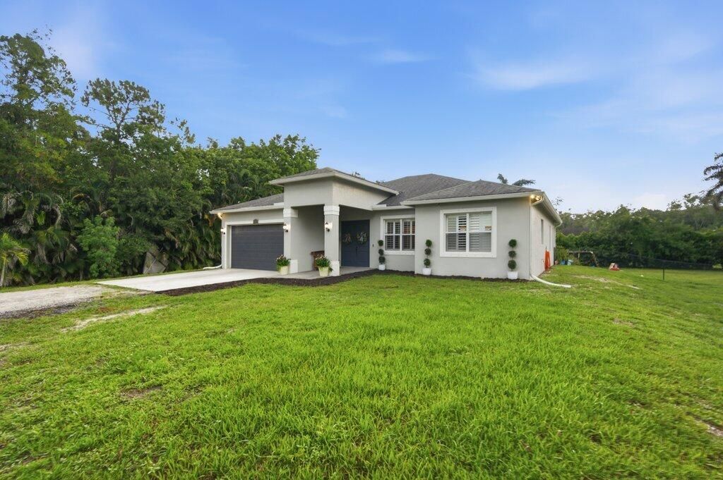 Photo of 18310 42nd Road N, The Acreage, FL 33470 (MLS # B26047165)