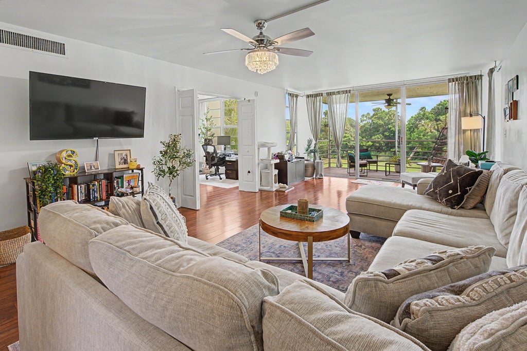 Photo of 3930 OAKS CLUBHOUSE Drive #304, Pompano Beach, FL 33069 (MLS # B26063984)