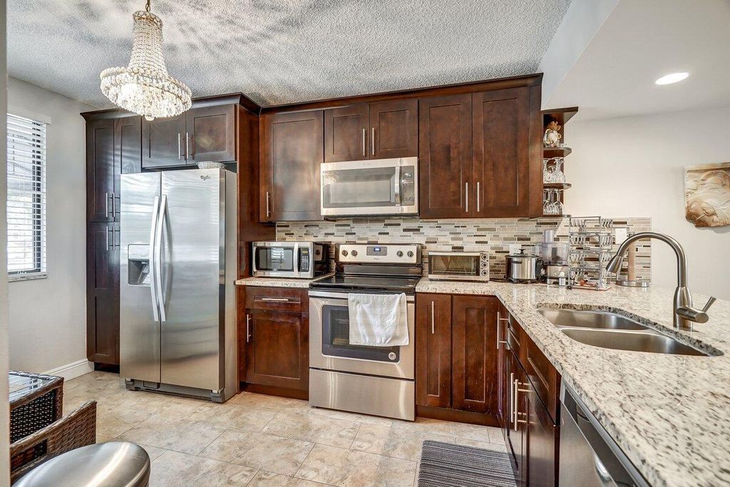 Photo of 2741 Village Boulevard #104, West Palm Beach, FL 33409 (MLS # R10913469)