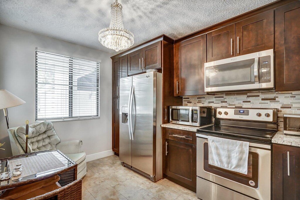 Photo of 2741 Village Boulevard #104, West Palm Beach, FL 33409 (MLS # R10913469)