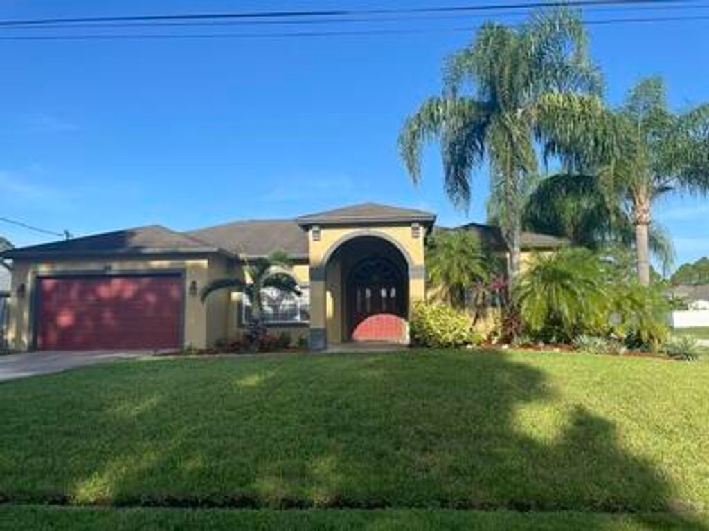 Photo of 3702 SW Masilunas Street St, Port Saint Lucie, FL 34953 (MLS # R10815462)