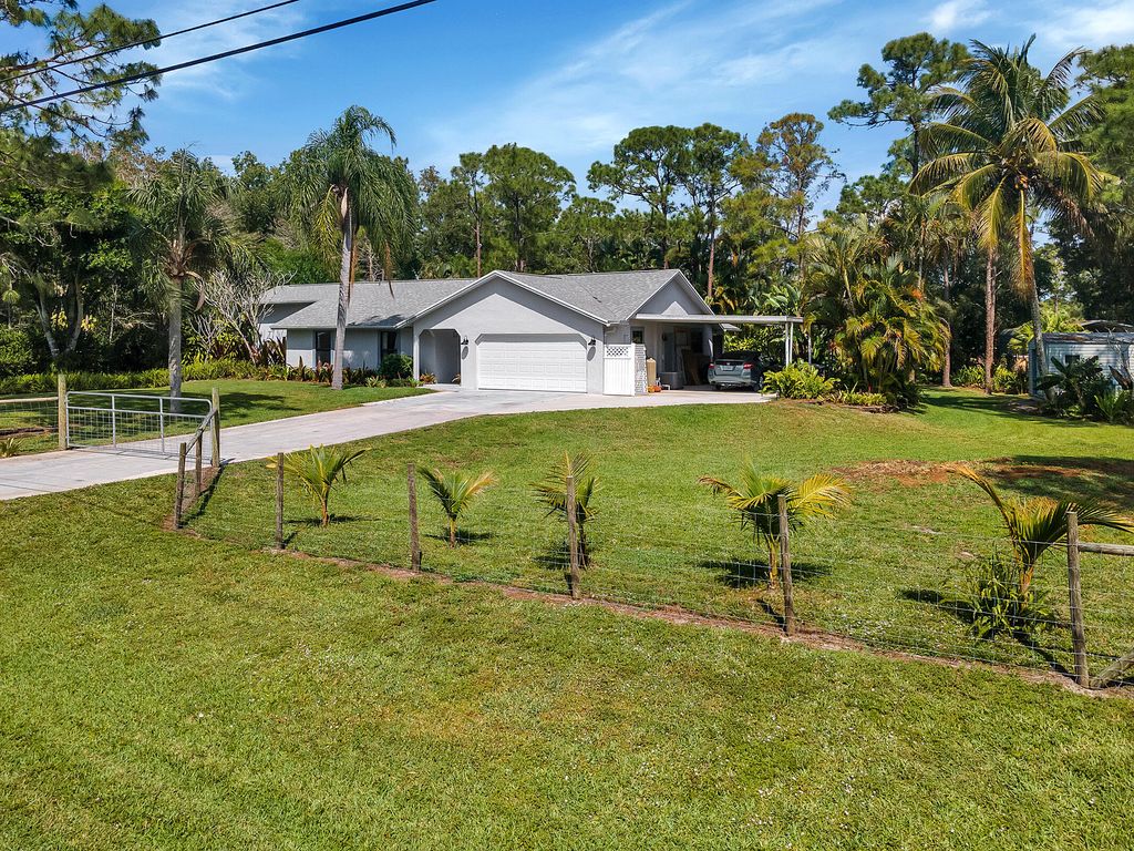 Photo of 16243 Stallion Drive E, Loxahatchee, FL 33470 (MLS # R10787094)