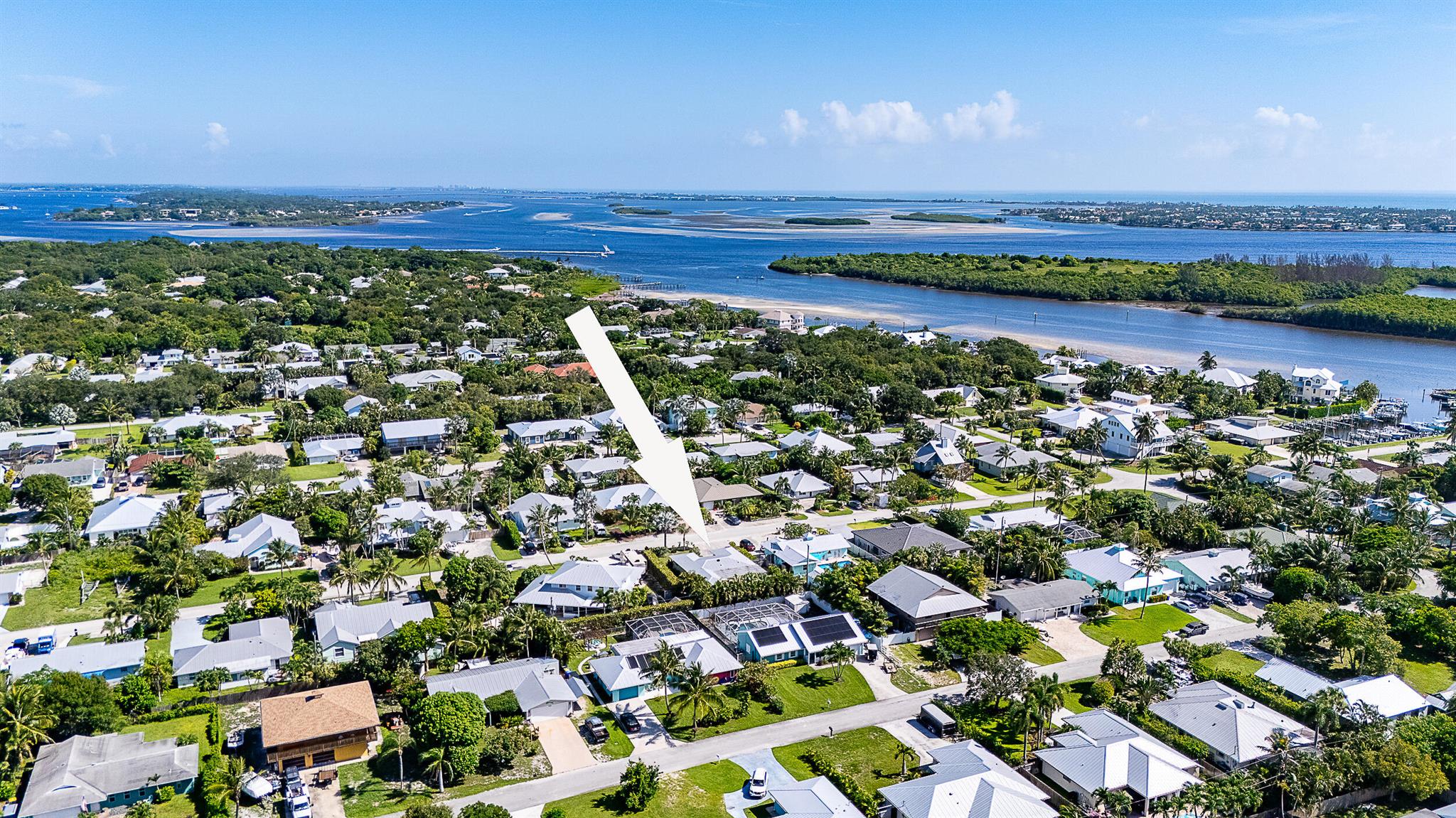 Step into style & comfort in this beautifully updated home. The renovated kitchen is an entertainer's dream, seamlessly connecting to the open living & dining areas, as well as the screened-in pool. Boaters & adventurers will love the ample side parking, perfect for storing a boat, RV, or other recreational toys. You're just mins from a nearby boat ramp & a short trip to a local kayak launch--complete with two kayaks included for your use! Outdoor enthusiasts will appreciate the close proximity to scenic nature trails & parks, offering endless opportunities for hiking, paddling, & exploring. When it's time for fun in the sun, the Stuart Sandbar is a favorite local destination!