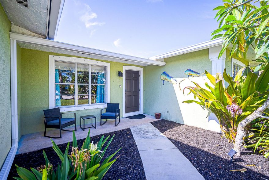 Step into style & comfort in this beautifully updated home. The renovated kitchen is an entertainer's dream, seamlessly connecting to the open living & dining areas, as well as the screened-in pool. Boaters & adventurers will love the ample side parking, perfect for storing a boat, RV, or other recreational toys. You're just mins from a nearby boat ramp & a short trip to a local kayak launch--complete with two kayaks included for your use! Outdoor enthusiasts will appreciate the close proximity to scenic nature trails & parks, offering endless opportunities for hiking, paddling, & exploring. When it's time for fun in the sun, the Stuart Sandbar is a favorite local destination!