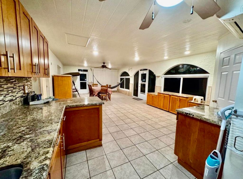 Photo of 5357 Rivermill Lane, Lake Worth, FL 33463 (MLS # B26003724)