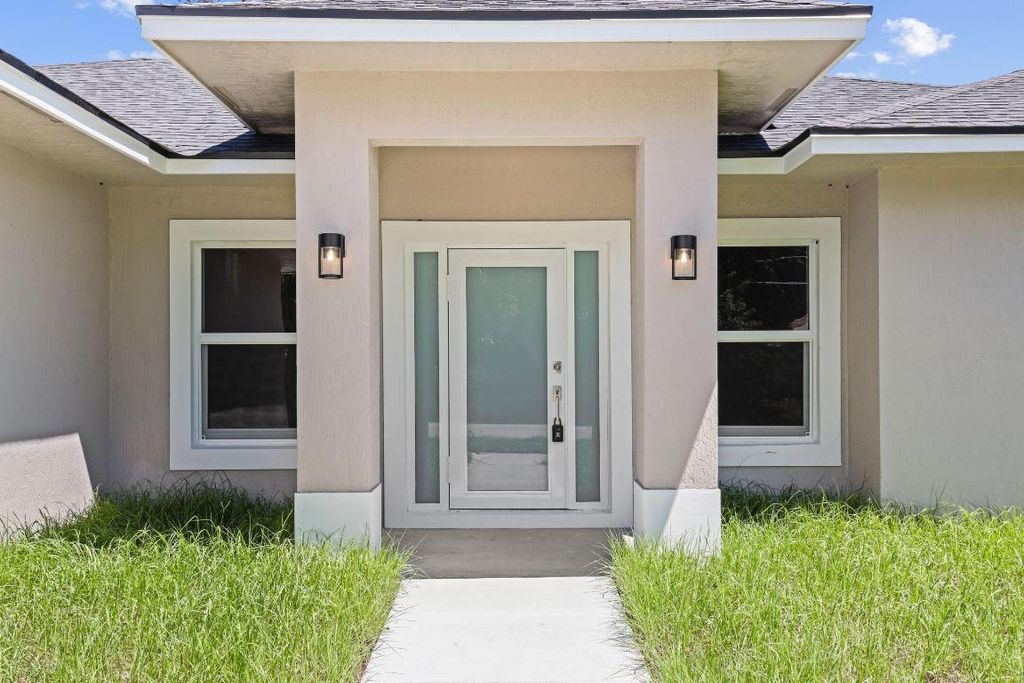 Photo of 4611 Sunset Boulevard, Fort Pierce, FL 34982 (MLS # R11154868)