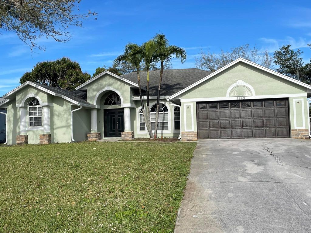 Photo of 2449 SW Chestnut Lane, Port Saint Lucie, FL 34953 (MLS # R11067563)