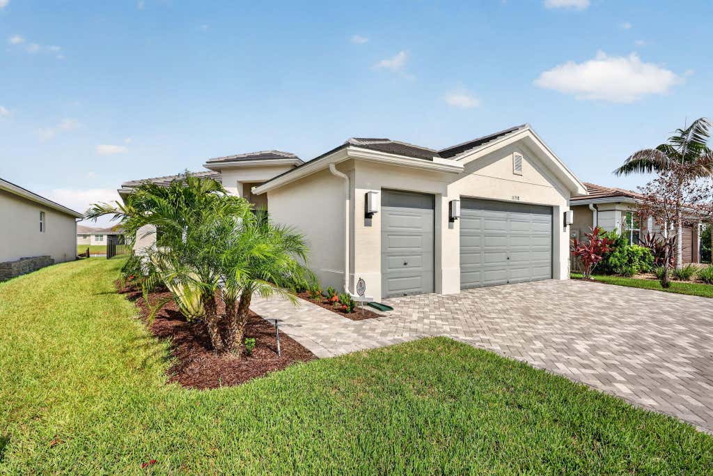 Photo of 11758 SW Coral Cove Parkway, Port Saint Lucie, FL 34987 (MLS # B26055567)