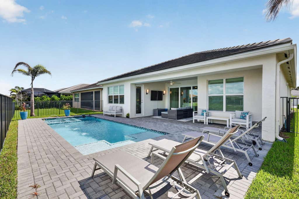 Photo of 11758 SW Coral Cove Parkway, Port Saint Lucie, FL 34987 (MLS # B26055567)