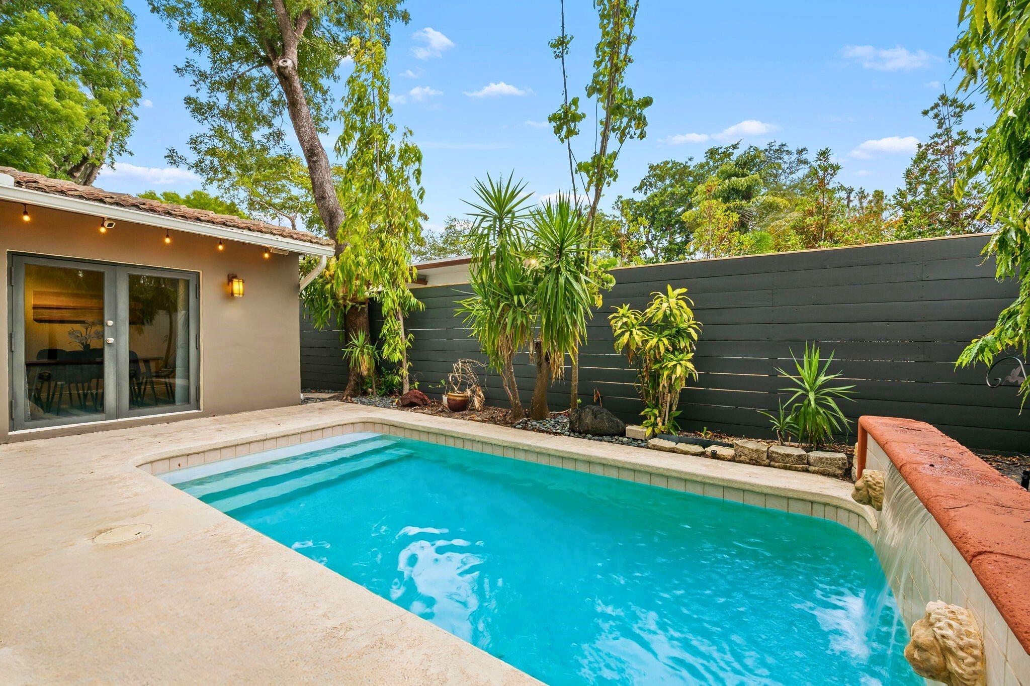 Experience the ultimate Fort Lauderdale lifestyle in this Colee Hammock home right in the heart of downtown & just steps from vibrant Las Olas Blvd, yet offering exceptional privacy. Walk to world-class restaurants, boutiques, galleries, parks, the Riverwalk, street festivals & the Broward Center for the Performing Arts. This fully furnished 3BR/3BA features a split floor plan, open & expansive living areas, spacious bedrooms, sleek updated kitchen w/ stainless steel appliances, formal dining, 2 updated baths & timeless Florida charm. Enjoy your private heated saltwater pool, BBQ & patio surrounded by lush greenery. Garage, 4-car driveway & plenty of storage included. Yard & pool service covered by owner for truly effortless living in one of the city’s most walkable, vibrant neighborhoods!