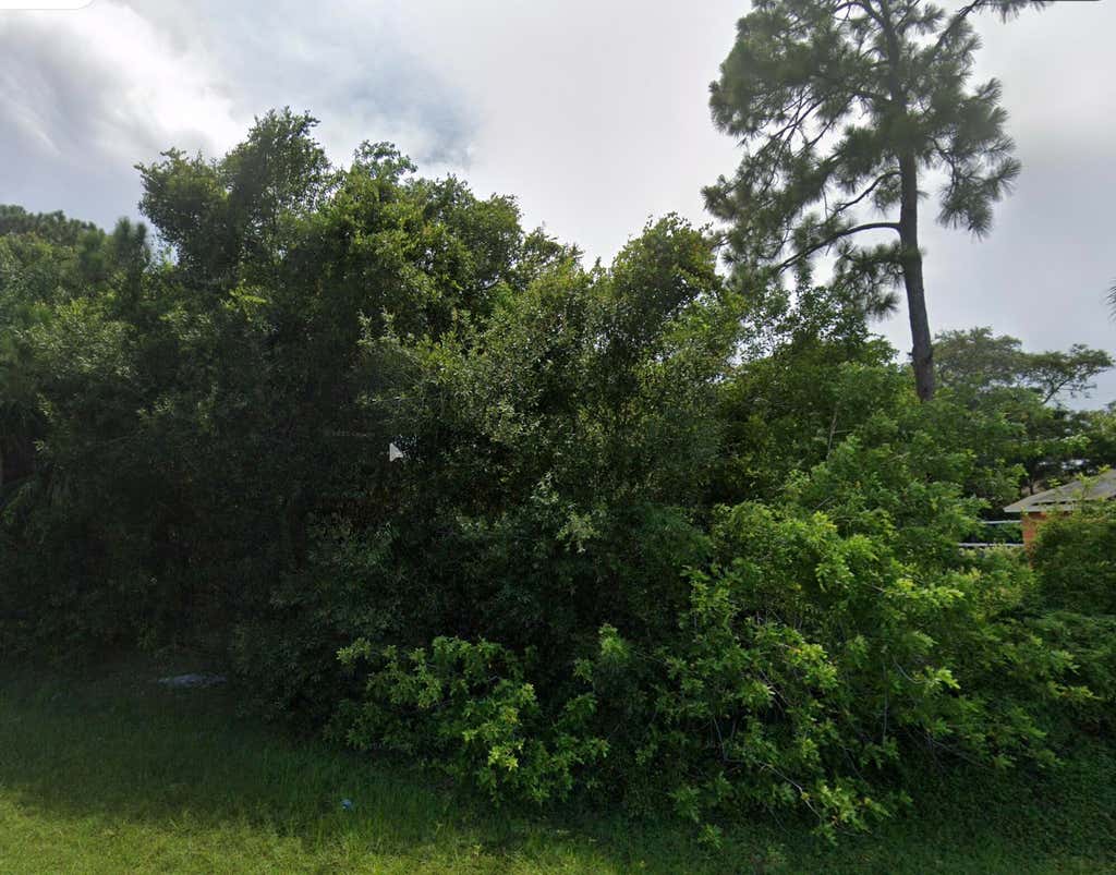 Photo of 4803 SUNSET Boulevard, Fort Pierce, FL 34982 (MLS # B26063461)